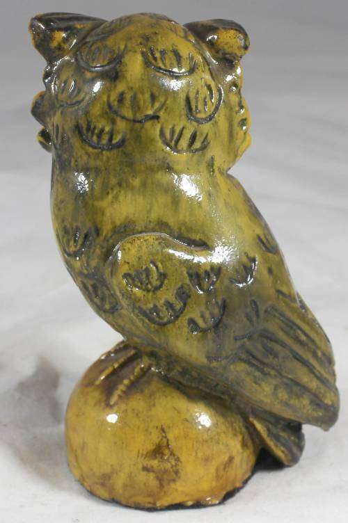 Stoneworks JHB - brown owl on a round pedestal