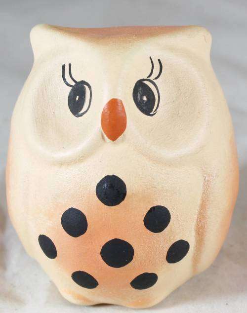 Pottery owl with black spots