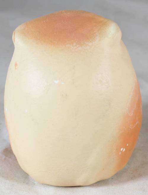 Pottery owl with black spots