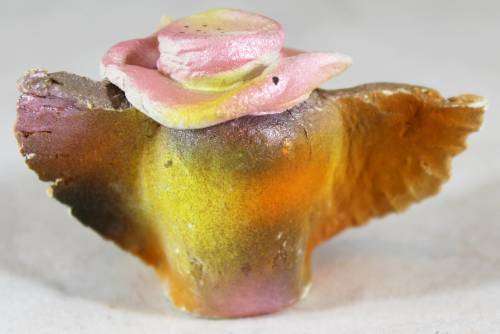 Miniature owl with a hat