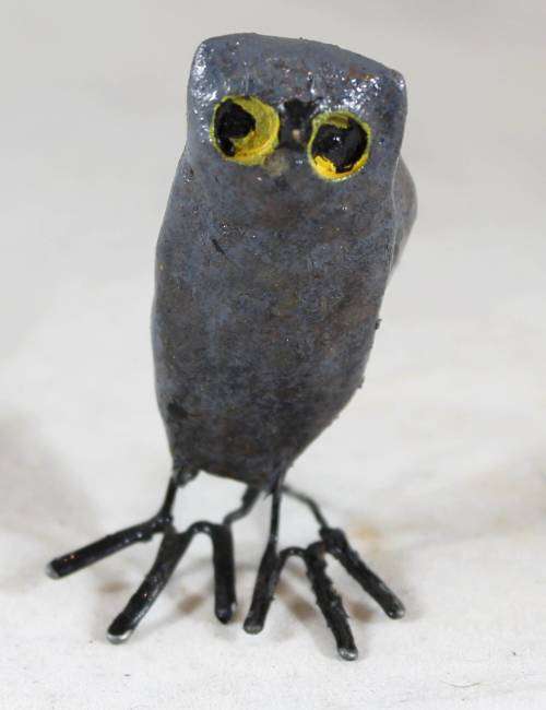 Owl with Metal Feet