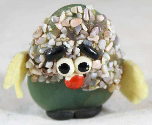 Stone Figure with Yellow Hands