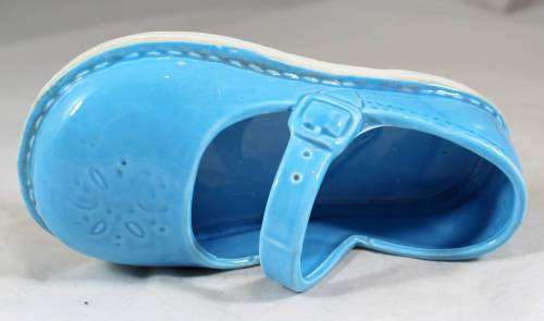 Blue baby-doll shoe with strap
