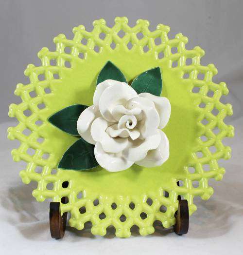 White rose on laced plate with stand