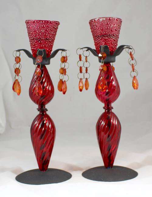 Pair of red glass candle holders