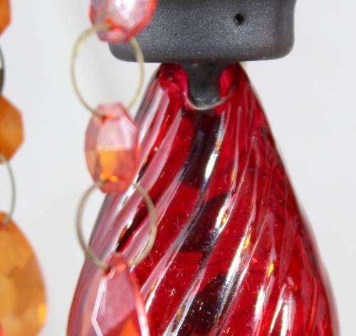 Pair of red glass candle holders