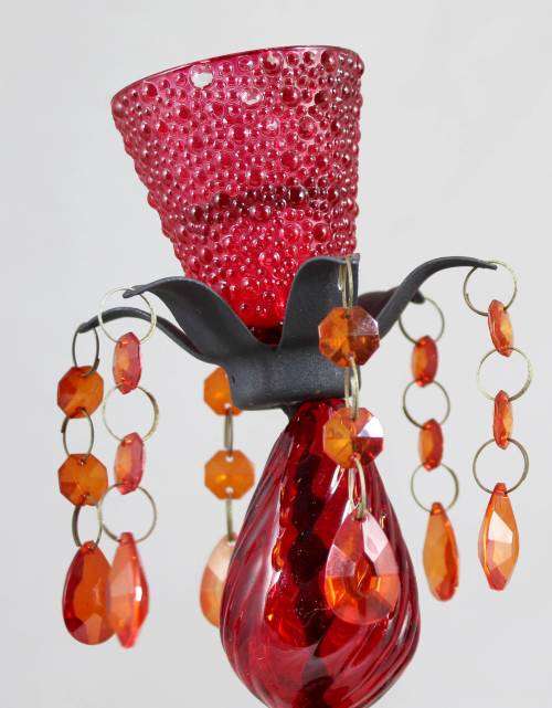 Pair of red glass candle holders