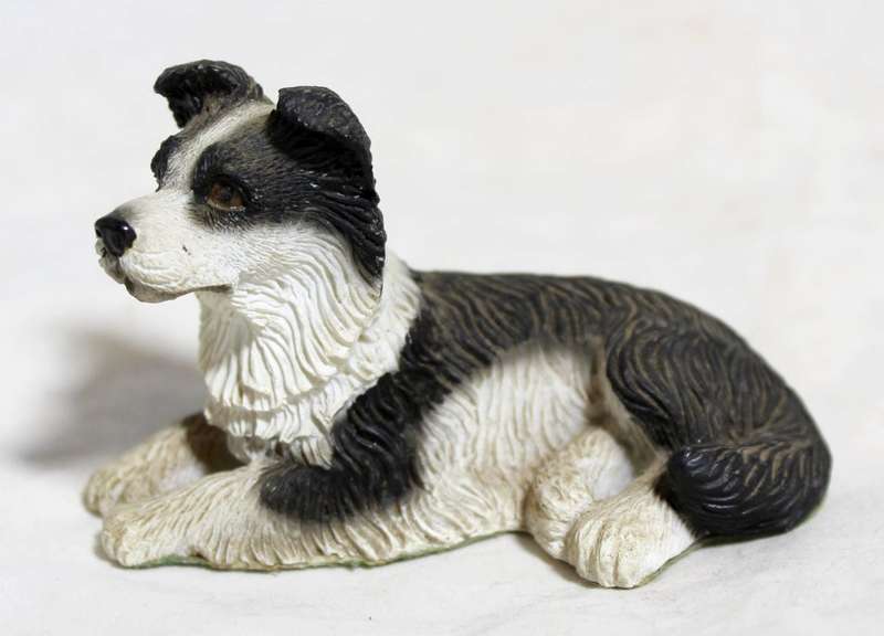 Regency fine arts - dog lying down
