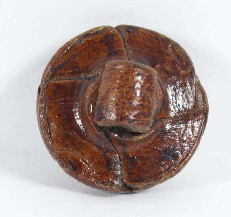 Hand carved wood button