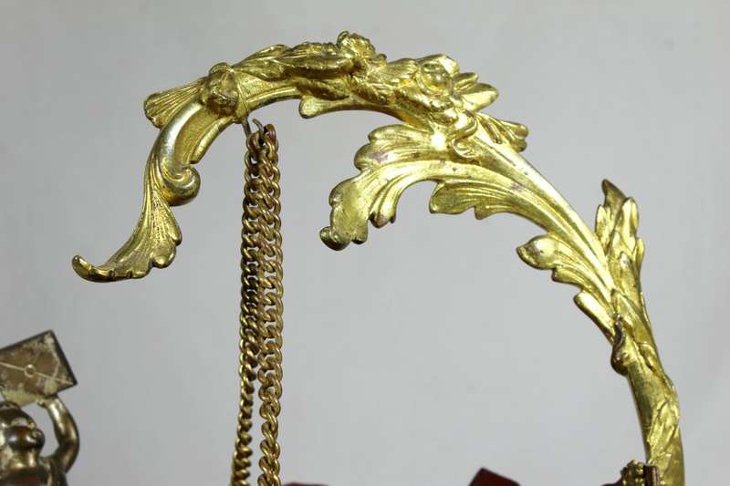 Brass hanging bowl with Cherub