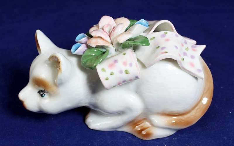 Cat with floral bow