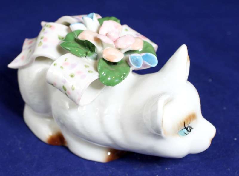 Cat with floral bow