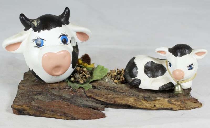 Cows on a tree stump
