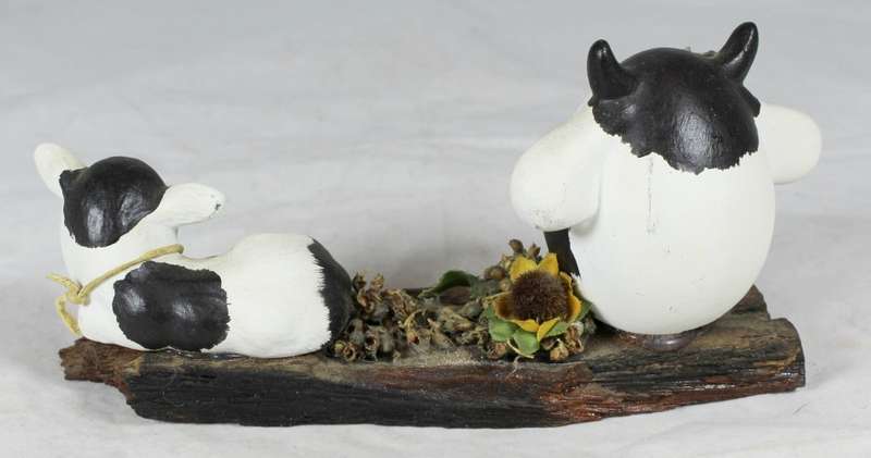 Cows on a tree stump