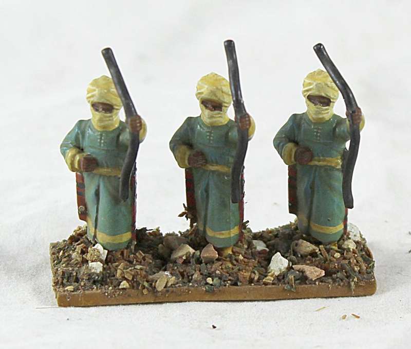 Lead figurines -three Arabian archers