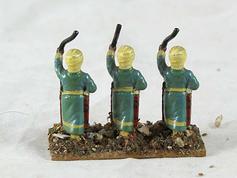 Lead figurines -three Arabian archers