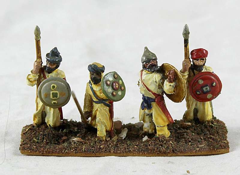 Lead figurine - four Eastern foot soldiers