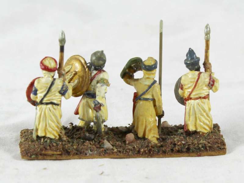 Lead figurine - four Eastern foot soldiers