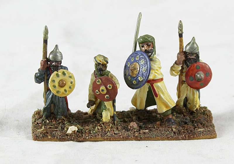Lead figurine - four Eastern foot soldiers
