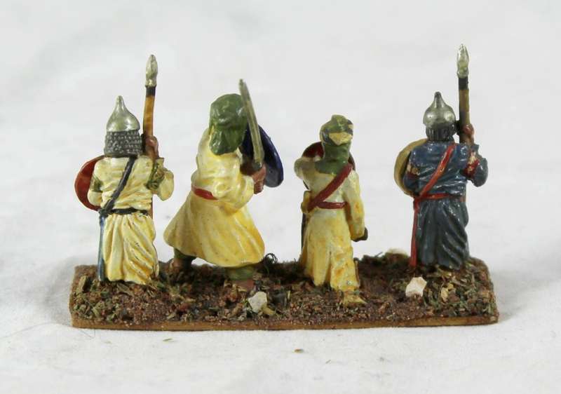 Lead figurine - four Eastern foot soldiers