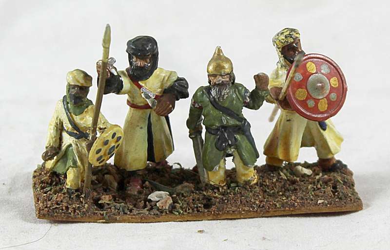 Lead figurine - four Eastern foot soldiers
