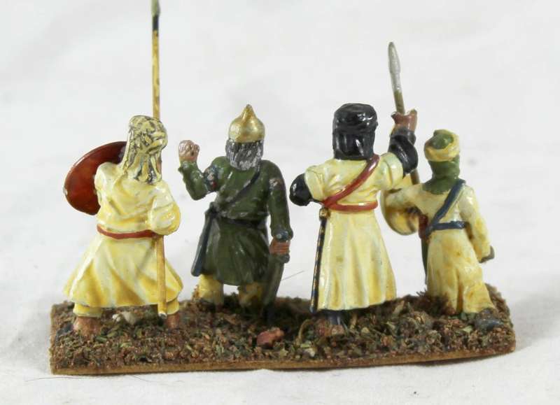 Lead figurine - four Eastern foot soldiers