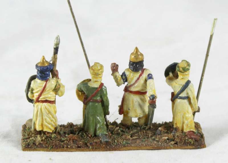 Lead figurine - four Eastern foot soldiers