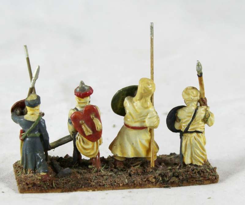 Lead figurine - four Eastern foot soldiers