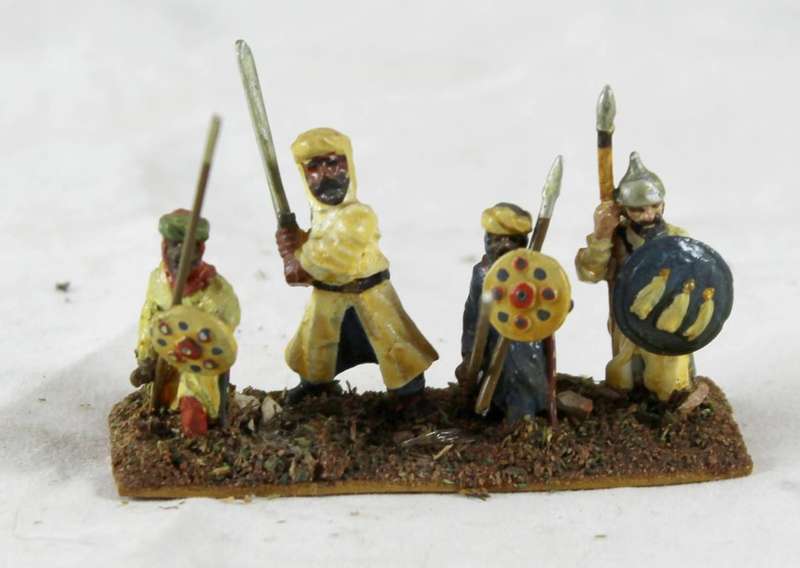 Lead figurine - four Eastern foot soldiers