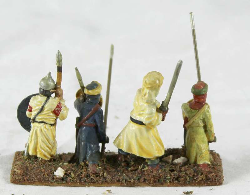 Lead figurine - four Eastern foot soldiers