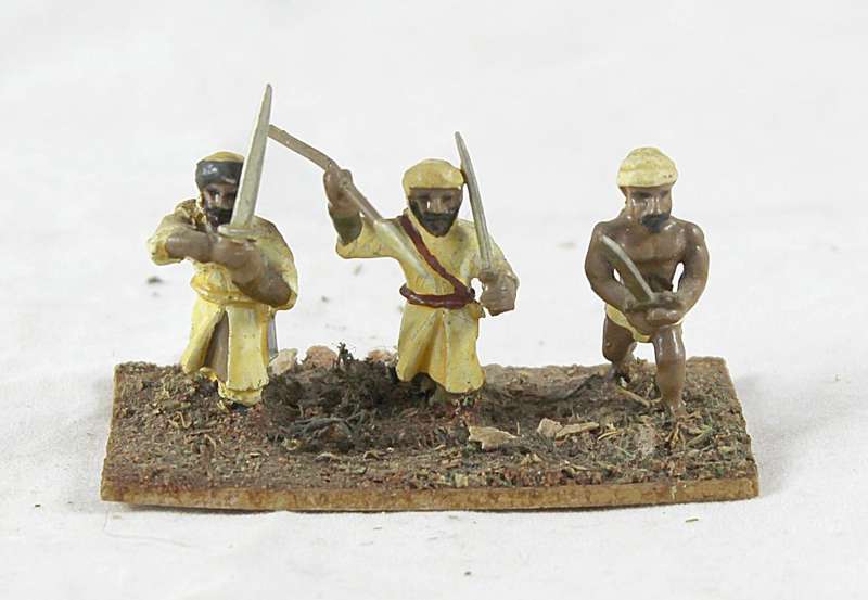 Lead figurine - three Eastern foot soldiers