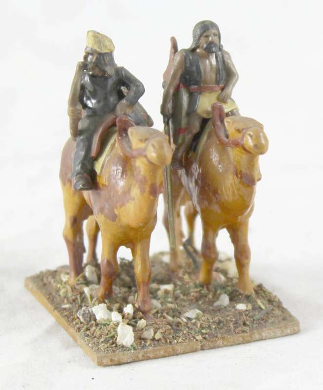 Lead figurine - pair of Arabian camelback warriors