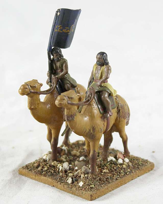 Lead figurine - pair of Arabian camelback warriors