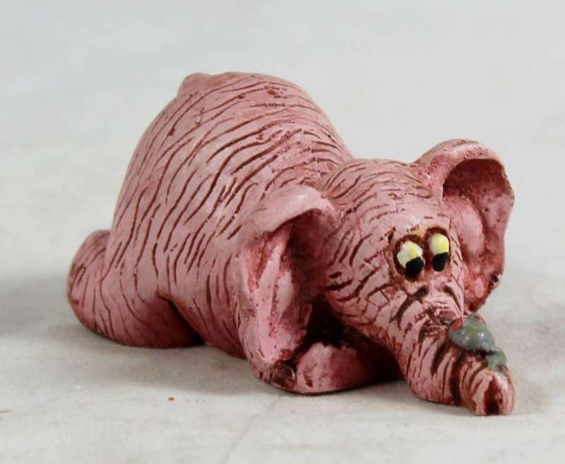 Pink elephant with mouse
