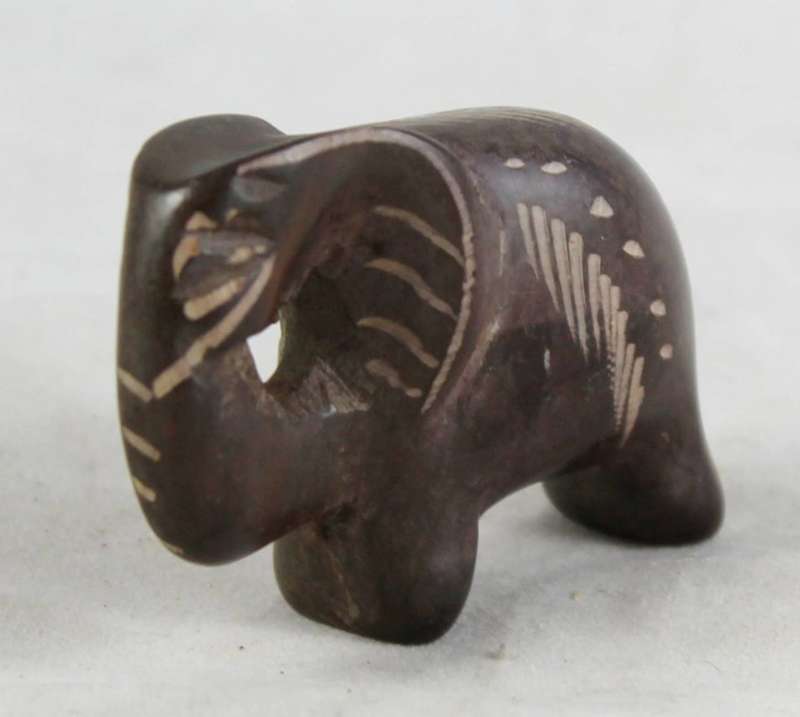 Small stone brown elephant