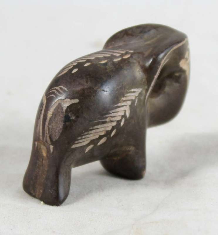 Small stone brown elephant
