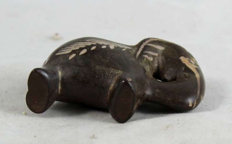 Small stone brown elephant