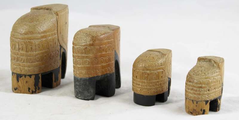 Carved wood elephants - family of four