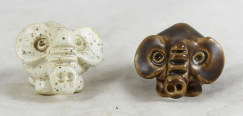 Pair miniature funky elephants