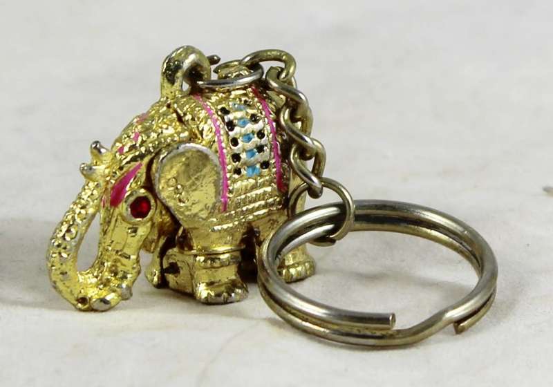 Gold coloured elephant locket key chain