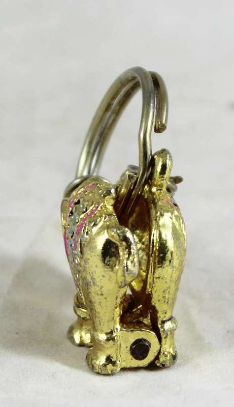 Gold coloured elephant locket key chain