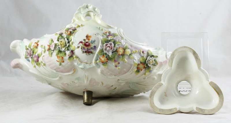 Very old center piece on stand - embossed flowers