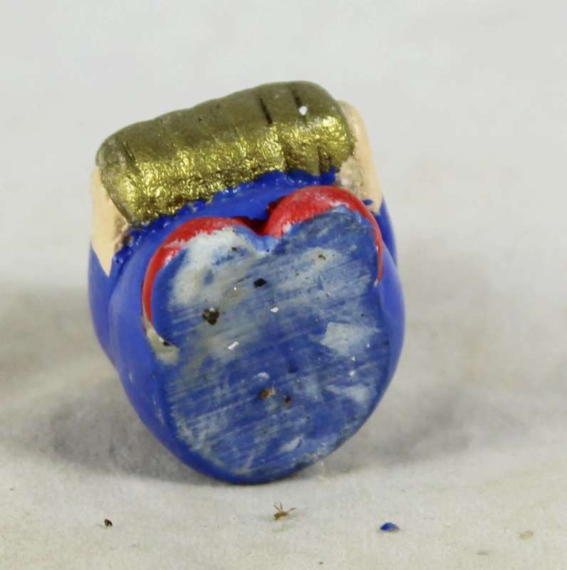 Miniature clown playing accordion