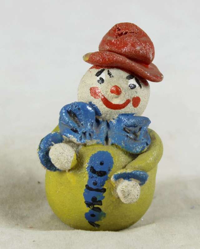 Miniature clown with a cowboy hat