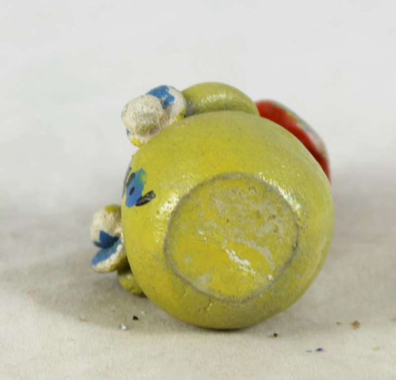 Miniature clown with a cowboy hat