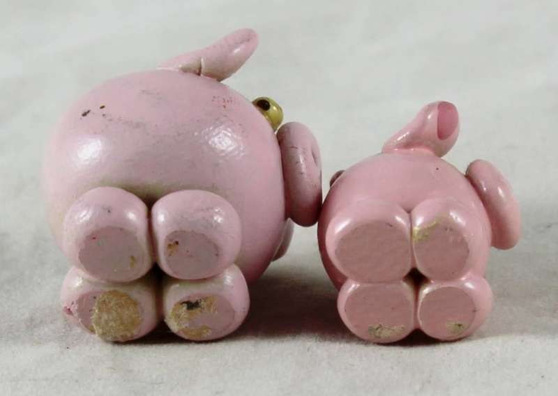 Miniature pair of pink pigs