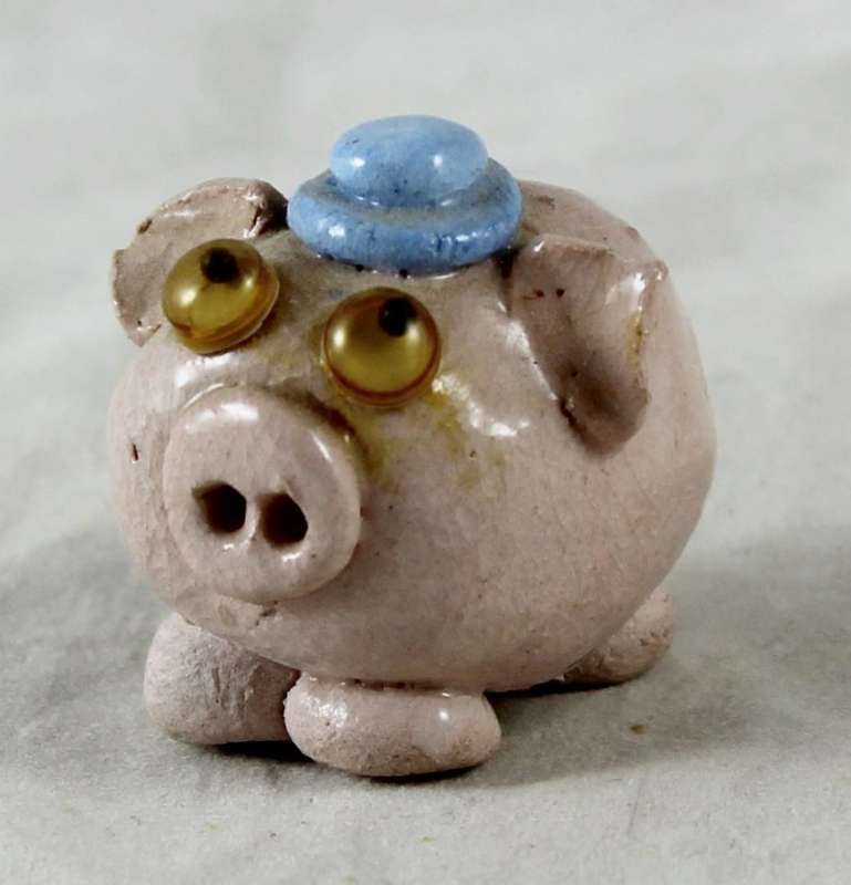 Small pig with blue hat