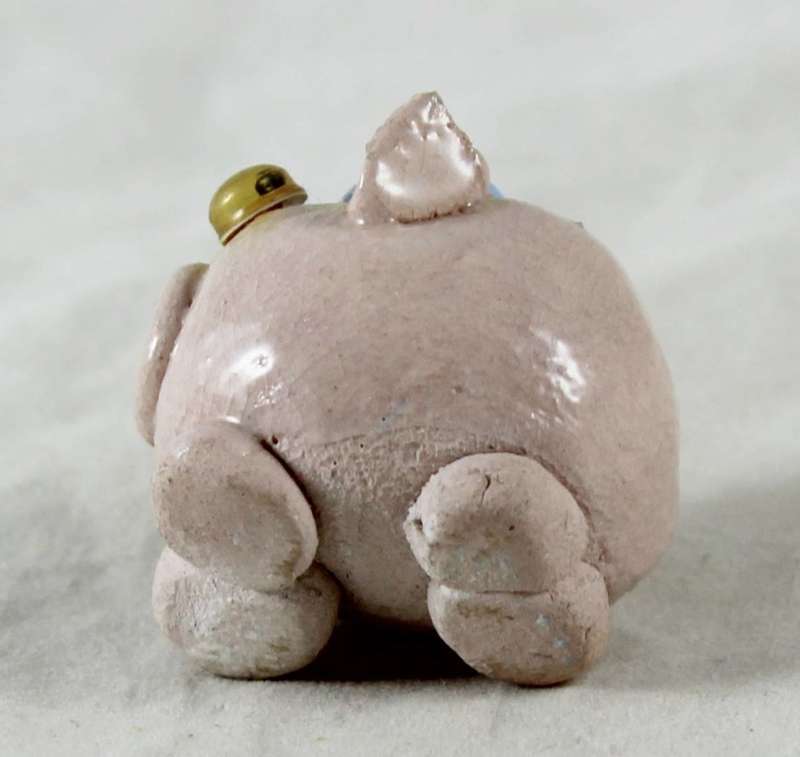 Small pig with blue hat