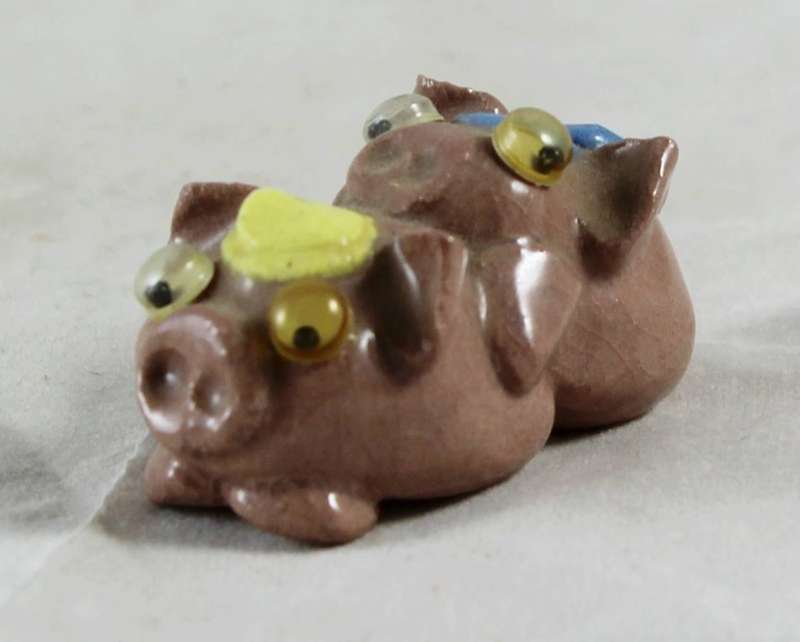 Miniature mating pigs
