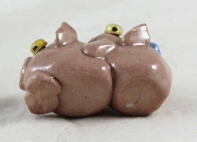 Miniature mating pigs
